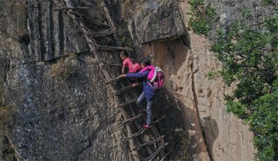 ​大凉山中的悬崖村，获国家6亿资助后修建钢梯，如今变成什么样？